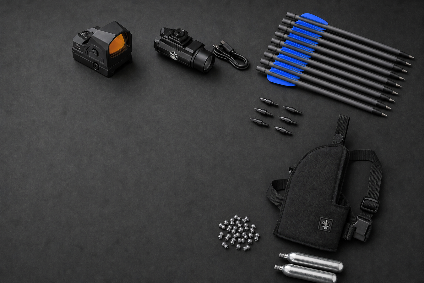 GoGun accessories flat lay with holster, pellets, arrows, tips, optics and CO2 cartridges